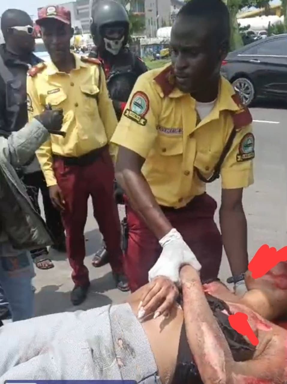 Lastma officials rescuing victims